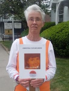 Barbara Cognetta holds a picture of Christina Taylor-Green, who was killed in a shooting in Tuscon, Arizona in 2011.