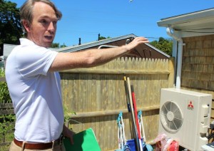 CCB MEDIA PHOTO Peter McPhee, renewable thermal program director with the Massachusetts Clean Energy Center, explains how a newly installed system at a Yarmouthport home works.