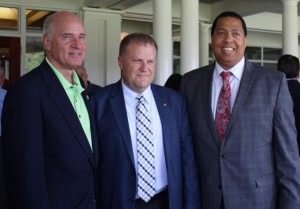 CCB MEDIA PHOTO Rodney Collins, center, poses with US Congressman Bill Keating and Mashpee Wampanoag Tribal Chairman Cedric Cromwell during a reception at Willowbend after Collins' swearing in as town manager.