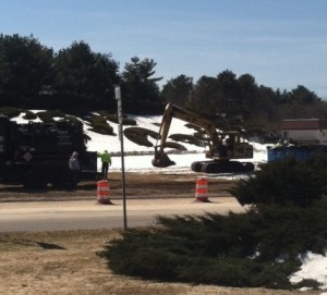 CCB MEDIA PHOTO Workers continue with cleanup of the gas spill at the Bourne Rotary.