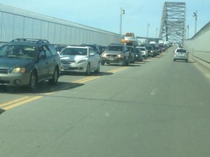 SEAN WALSH/CCB MEDIA FILE PHOTO Cars back up as they travel on Cape over the Bourne Bridge.