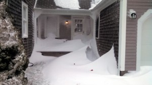 Drifts form in front of a house in Sandwich.