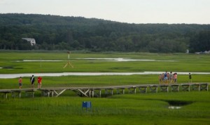 CCB MEDIA PHOTO The 1,350-foot Sandwich Boardwalk crosses Mill Creek and the marsh and leads to Town Beach on Cape Cod Bay.