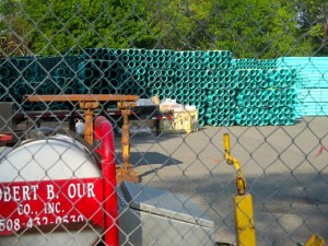 CCB MEDIA FILE PHOTO Sewer pipes are stacked up near the corner of Spring Bars Road and Worcester Court in advance of being installed in the Maravista neighborhood in Falmouth.
