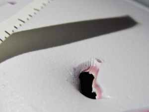 Photo courtesy of John Chisholm of State Marine Fisheries. The size and pattern of the bite on the kayak suggest an exploratory bite from a Great White Shark. The striations around the tooth hole in the first two of these photos were caused by the serrated edges found on a Great White’s teeth, according to Chisholm.