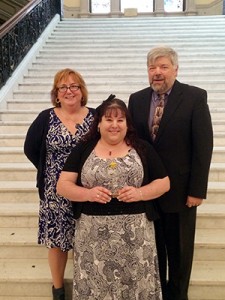 COURTESY CAPE COD COMMUNITY COLLEGE Christina Soltis, center, member of the Cape Cod Community College Class of 2015, poses at the Statehouse with CCCC faculty member Kate Martin and CCCC President John Cox.