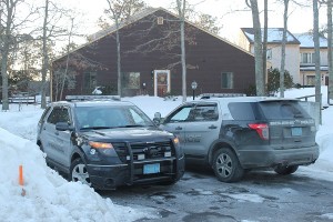 CCB MEDIA PHOTO Bourne police officers are still at the murder scene this morning on Roundhouse Road in Monument Beach.