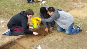 Eighth grade students working at the dig on Wednesday including Max Walsh, left, Troy Johnson, middle, and Noah Shenk, right.