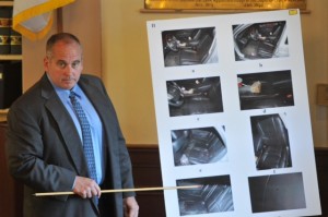 STEVE HEASLIP/CAPE COD TIMES POOL Barnstable Police Sgt. John York points out interior views of a rental car recovered in the West Barnstable Commuter lot that was found to contain human flesh, blood stains and bullet fragments at Barnstable Superior Court in the first day of testimony in the trial of Quoizel Wilson being tried for the murder of Trudie Hall. 
