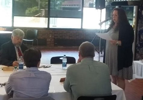 Claudine Barnes, a full-time faculty member, speaks during the Cape Cod Community College Board of Trustee's meeting.