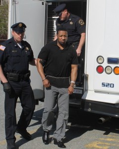 CCB MEDIA PHOTO Quoizel Wilson is led into the Barnstable Superior Courthouse for his murder trial.