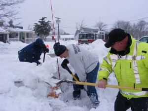 COURTESY OF THE BARNSTABLE COUNTY SHERIFF'S OFFICE Inmates help shovel out hydrants on Main Street in Buzzards Bay on Tuesday.